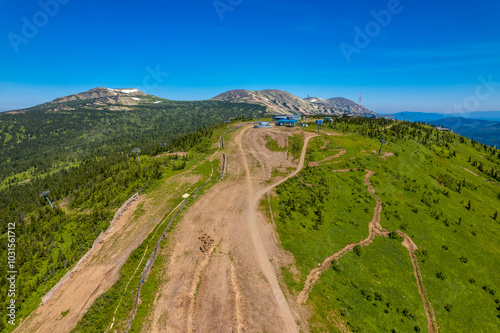 Sheregesh ski resort in summer, landscape on mountain Mustag, aerial top view Kemerovo region Russia