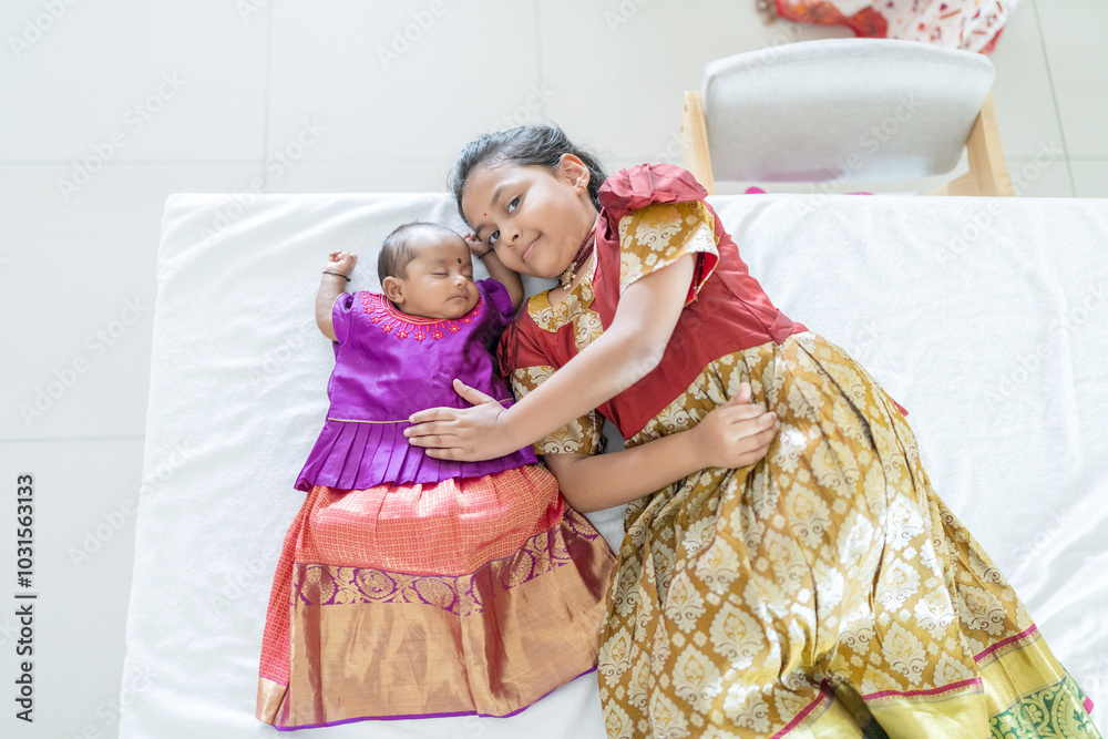 Φωτογραφία ndian family spending time together, wearing traditional and casual outfits with a baby, a young girl, and grandparents in a high-rise apartment in Kuala Lumpur, Malaysia