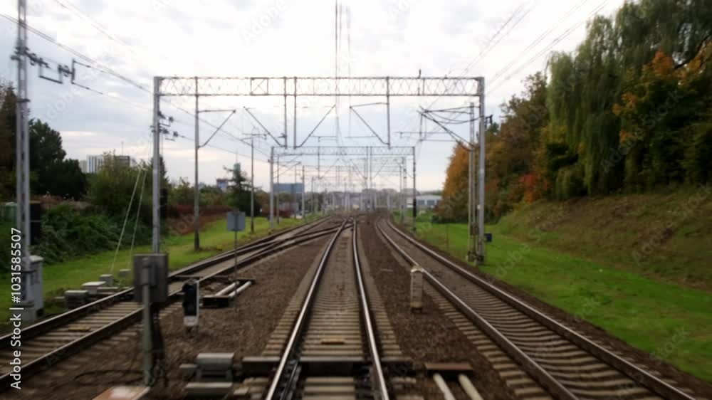 A close-up of the tracks captured while the train is in motion creates a dynamic sense of speed and travel. This shot conveys the energy of the journey and opens up new horizons.
