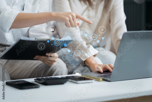 Learning online working concept. Businesswoman working on tablet and laptop computer, searching working in office.