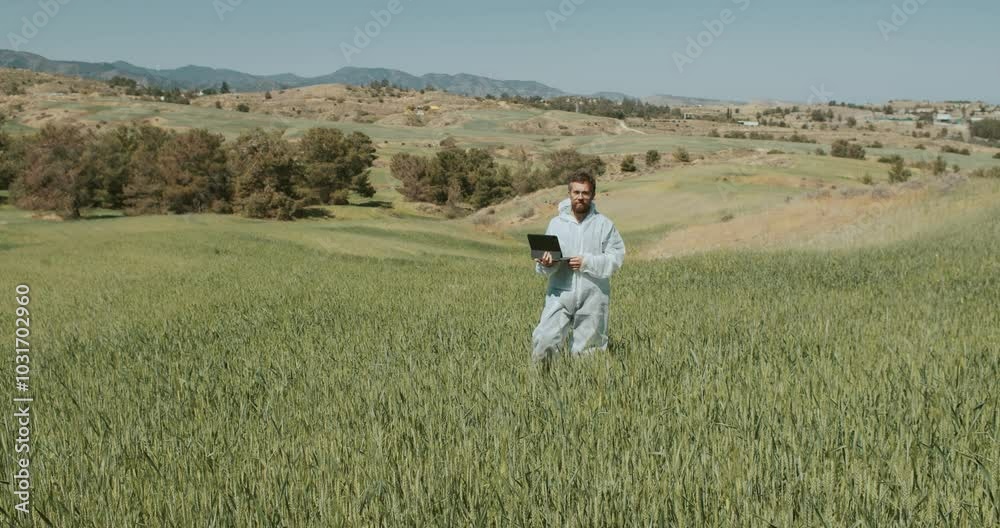 A dedicated scientist in vibrant green fields is conducting important research work A dedicated scientist in vibrant green fields is conducting important research work