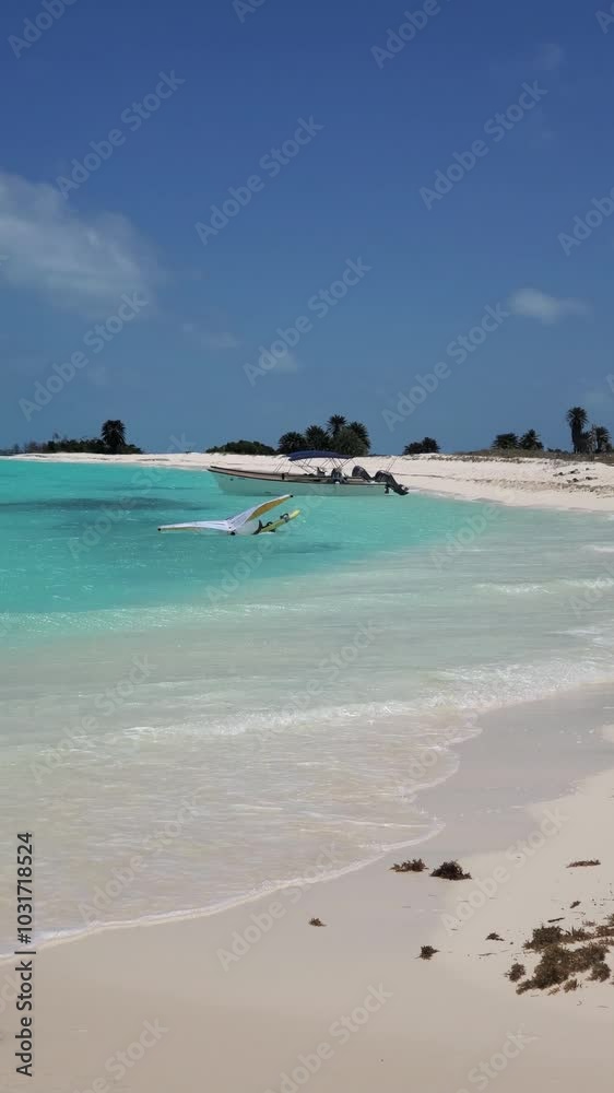 Man falls into water while foiling on Caribbean Sea beach Cayo de Agua island Man falls into water while foiling on Caribbean Sea beach Cayo de Agua island