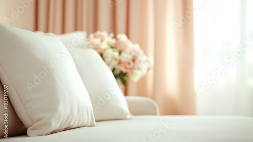 A serene bedroom setting featuring soft pillows, a bouquet of flowers, and flowing curtains, all bathed in warm natural light, inviting comfort and relaxation. photo