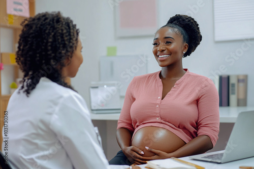 Shot of a pregnant black woman having a consultation with a doctor