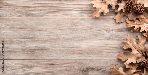 A rustic wooden background with dried leaves and pinecones, ideal for seasonal decor.