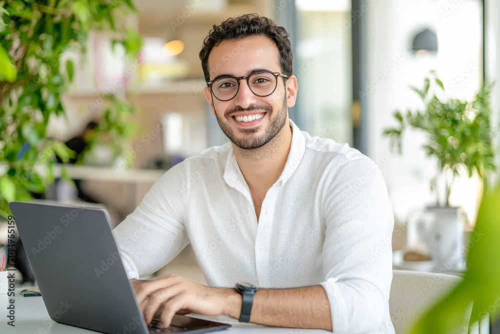 young happy businessman working on laptop young happy businessman working on laptop