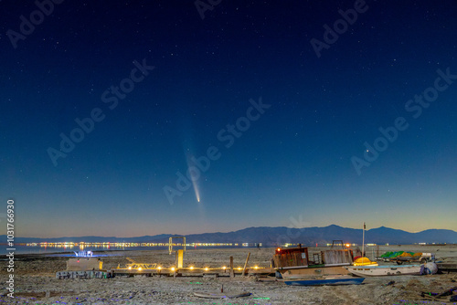 Comet C/2023 A3 (Tsuchinshan–ATLAS) over a dried out boat dock near the Salton Sea in Bombay Beach, California