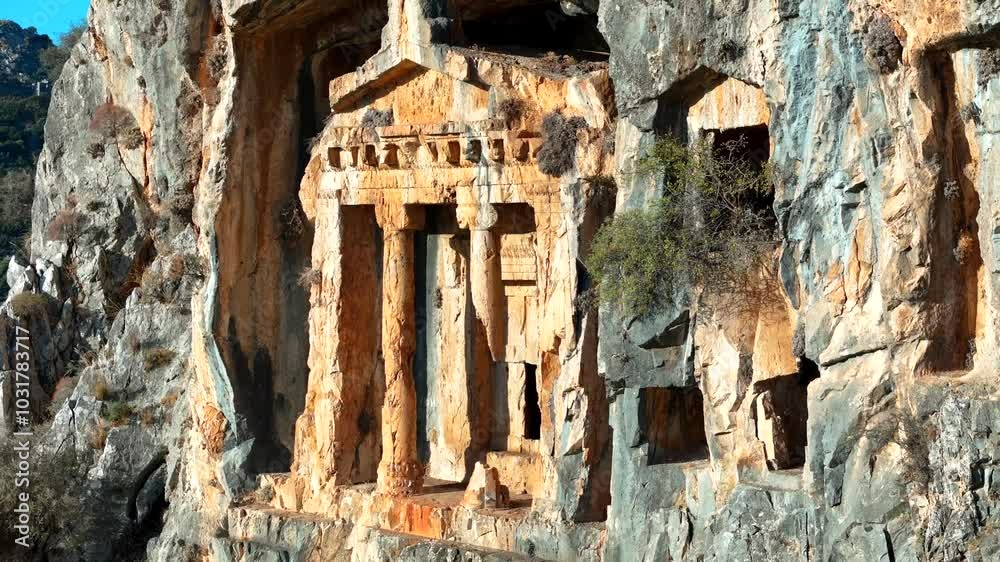 Ancient Dalyan Tombs. Dalyan Rock Tombs, dating back to BC and lasting for 2800 years, are among the borders of Candır Village. Ancient Dalyan Tombs. Dalyan Rock Tombs, dating back to BC and lasting for 2800 years, are among the borders of Candır Village.