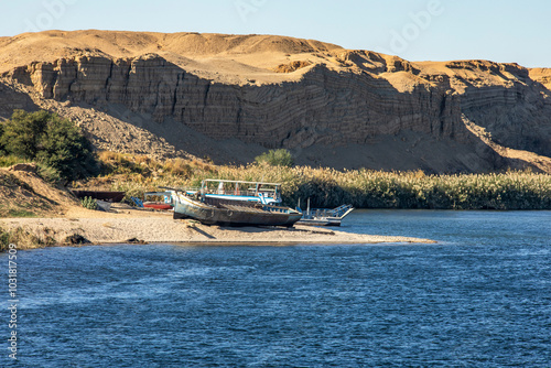 Sail through time on a luxurious Nile River cruise. Witness ancient wonders, relax on the sundeck, and enjoy the comfort of your floating hotel. photo