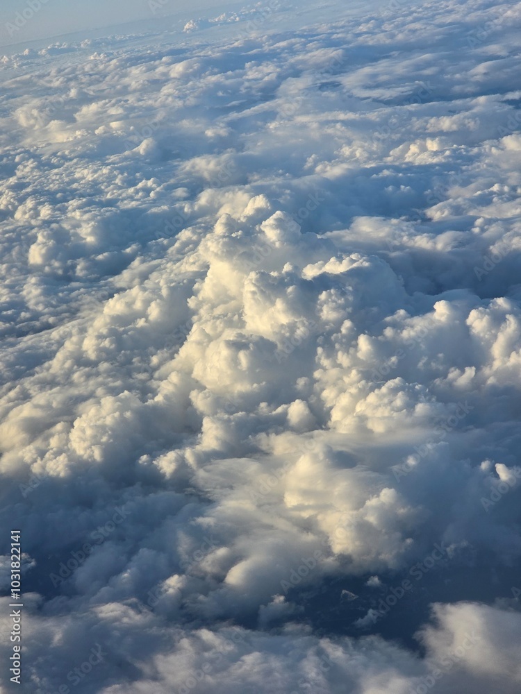 Fototapeta premium Above the Clouds: A Peaceful cloudy sky.