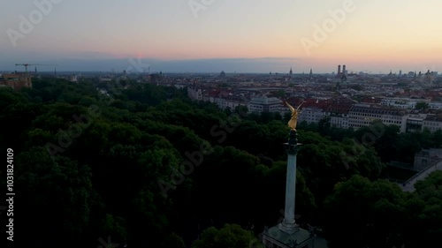 Aerial view circling the Angel of Peace or Friedensengel in Munich, Germany photo