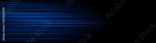 Abstract blue laser beam. Lighting effect. Directional spotlight. Light streaks fading into darkness on a black background, creating a dynamic and abstract effect.