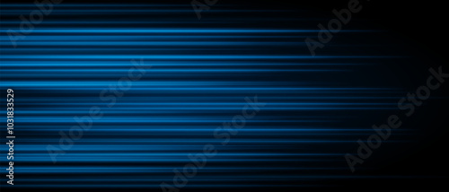 Abstract blue laser beam. Lighting effect. Directional spotlight. Light streaks fading into darkness on a black background, creating a dynamic and abstract effect.