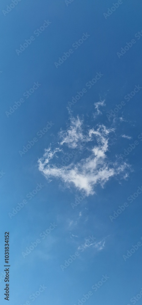 tiny cloud on the blue skies