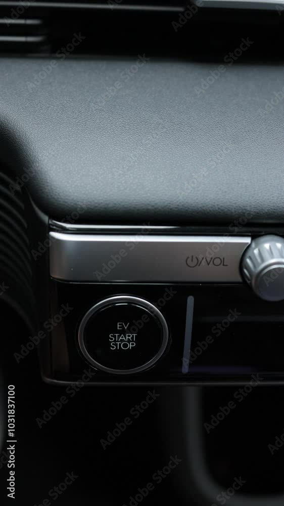 Vertical video of start stop Button to start keyless car electro engine. Starting car engine. Button to start the car engine. Pressing Stand By Power Button To Turn On and Off the Electric Car Vertical video of start stop Button to start keyless car electro engine. Starting car engine. Button to start the car engine. Pressing Stand By Power Button To Turn On and Off the Electric Car