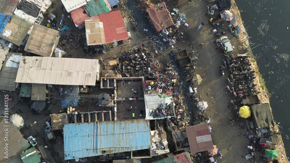 Ghana, Accra,   AGBOGBLOSHIE the largest landfill illegal dump in Africa for electronic and plastic waste from the Western world. High environmental toxic pollution area , climate change warming 