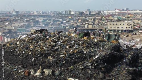Ghana, Accra,   AGBOGBLOSHIE the largest landfill illegal dump in Africa for electronic and plastic waste from the Western world. High environmental toxic pollution area , climate change warming 