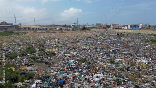 Obraz na płótnie Ghana, Accra, AGBOGBLOSHIE the largest landfill illegal dump in Africa for electronic and plastic waste from the Western world. High environmental toxic pollution area , climate change warming w salonie