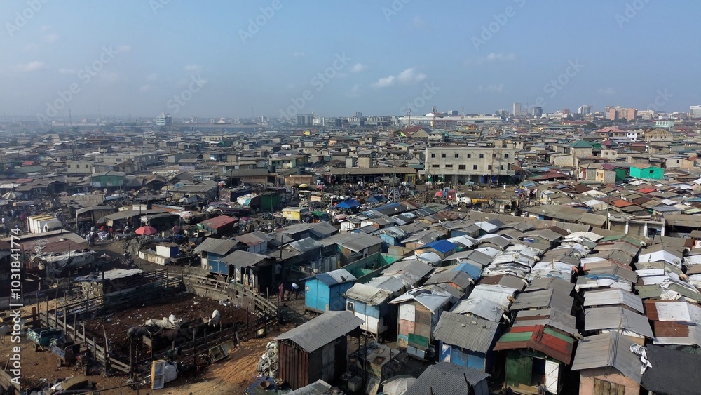 People live in slums immersed immersed in toxic waste that poisons the land and river waters in Africa Africa Ghana AGBOGBLOSHIE. high environmental pollution area , Climate change global warming