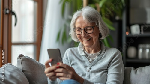 Senior woman with a smartphone, connection and social media at home. Mature female, person and old lady with a cellphone, email and mobile app with network, happiness and typing