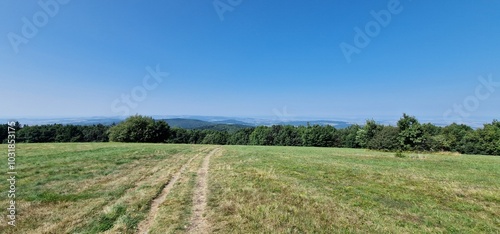 velka javorina the peak of mountain bile karpaty transmitter and surrounding meadow and forests holubiho chata photo