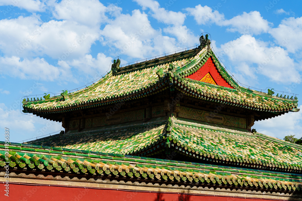 Fototapeta premium Decoration details of gates and palaces in the Temple of Heaven under blue sky, a major landmark and travel destination in Beijing, China