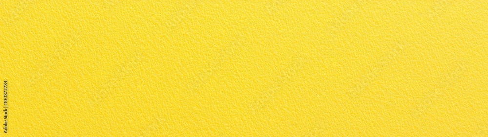 Bright yellow plain paper texture with a smooth finish Bright yellow plain paper texture with a smooth finish