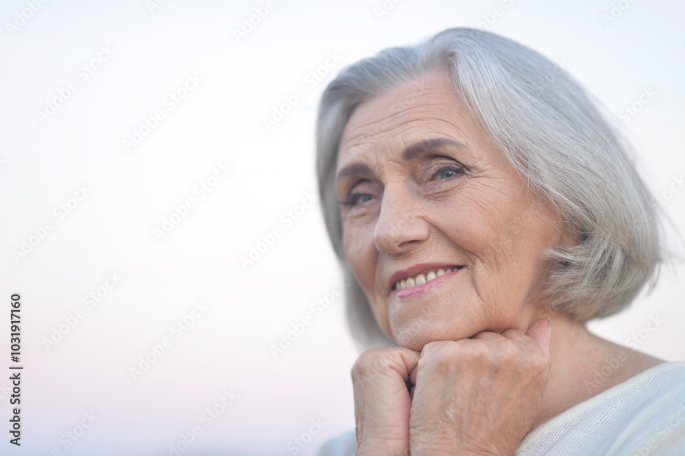 Portrait of a beautiful woman in the park in summer Portrait of a beautiful woman in the park in summer