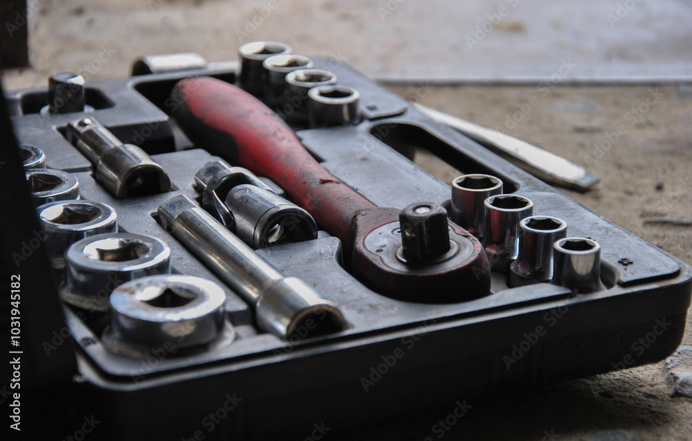 Fototapeta premium set of tools for repair. toolbox close up. dark photo. garage repair tool
