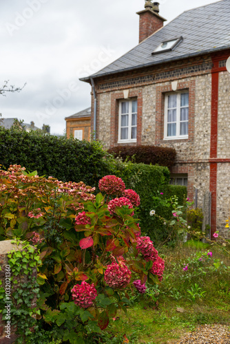 english country house with flowers