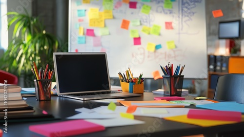 Modern Office Workspace with Laptop Pens and Colorful Sticky Notes
