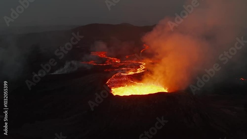 Close-up view of erupting volcano in Iceland with explosions of hot lava photo