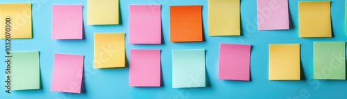 Multicolored sticky notes arranged on a blue background