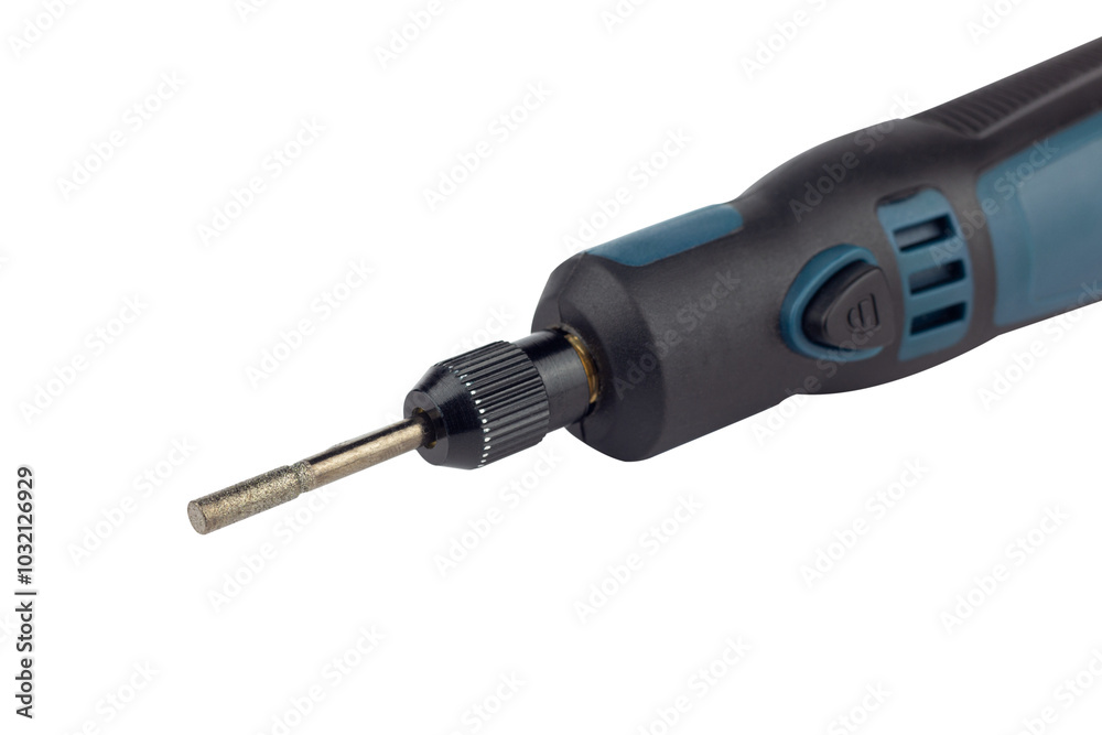 hand engraver with cutter for hand engraver and drill with diamond filings, mini hand drill on battery isolated from background hand engraver with cutter for hand engraver and drill with diamond filings, mini hand drill on battery isolated from background