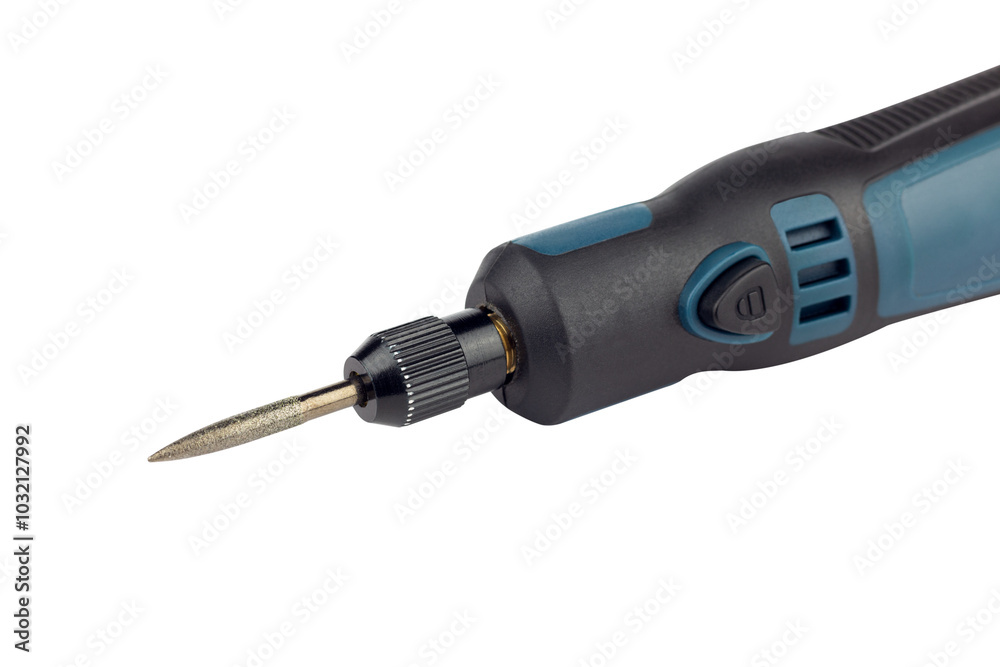 hand engraver with cutter for hand engraver and drill with diamond filings, mini hand drill on battery isolated from background hand engraver with cutter for hand engraver and drill with diamond filings, mini hand drill on battery isolated from background