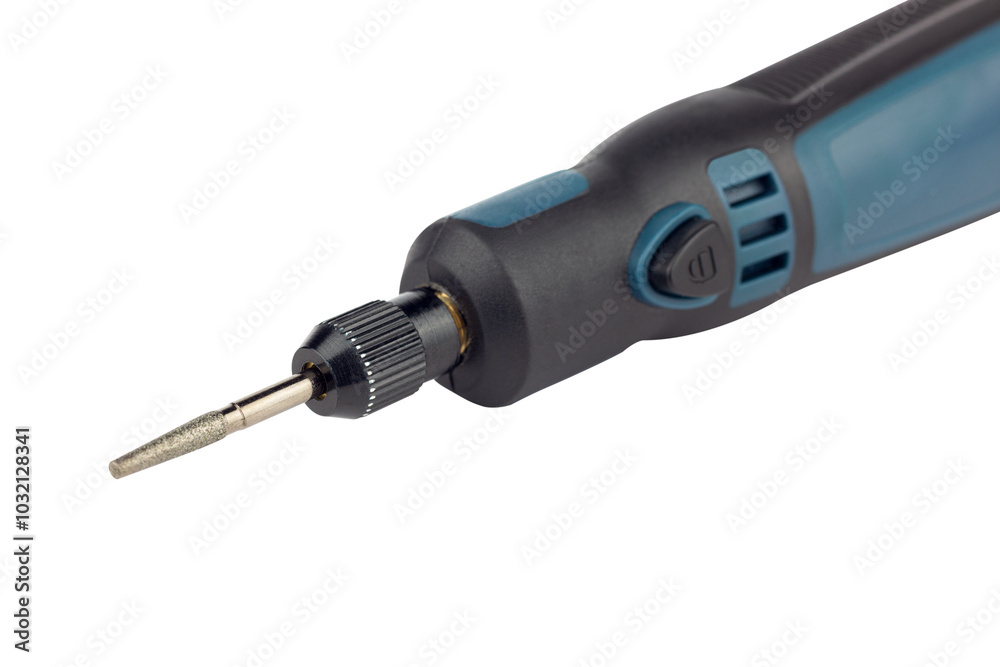 hand engraver with cutter for hand engraver and drill with diamond filings, mini hand drill on battery isolated from background hand engraver with cutter for hand engraver and drill with diamond filings, mini hand drill on battery isolated from background