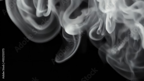 Rapid smoke puff on black background