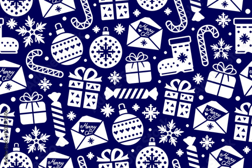 Blue and white seamless Christmas pattern. New Year repeating pattern wit candy, gift boxes, snowflakes, Christmas balls and letters.