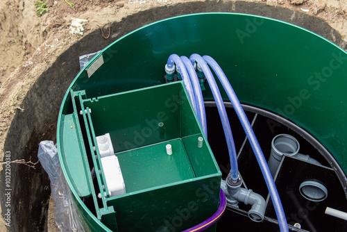 Open septic tank. Septic tank design and internal communications. Pipes and hoses. Autonomous sewage system  photo