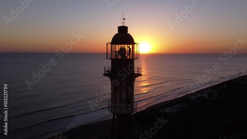 Eiffel Tower-Inspired Metal Lighthouse at Monte Hermoso: One of the Oldest Metal Structures in Argentina, Captured During a Stunning Sunset by the South Atlantic Coast.Breathtaking Views