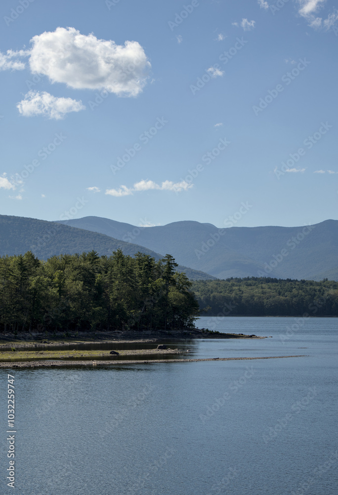 view of the catskills mountains with ashokan reservoir in the foreground on a bright sunny day in the summer (hudson valley catskill hills) scenic travel destination upstate new york lake pond view of the catskills mountains with ashokan reservoir in the foreground on a bright sunny day in the summer (hudson valley catskill hills) scenic travel destination upstate new york lake pond