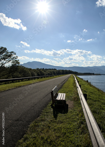 arched bridge across the ashokan reservoir in hudson valley upstate new york (nyc drinking water lake pond) summer day public park promenade walking hiking biking cycling trail path rail photo