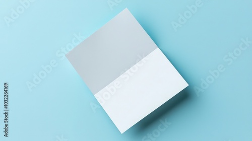 Folded leaflet template for desktop calendar, blank white paper on a solid background