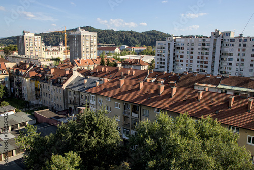 traditional residential buildings in ljubjlana slovenia (european europe travel destination) historic architecture tall balconies downtown city center mountains julian alps adriatic