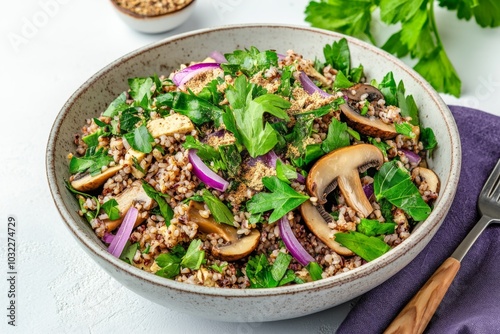 Vegan Larb Bowl Delight, a vibrant mix of seasoned tofu and mushrooms, garnished with toasted rice powder, red onions, and fresh herbs, served in a stylish bowl. photo