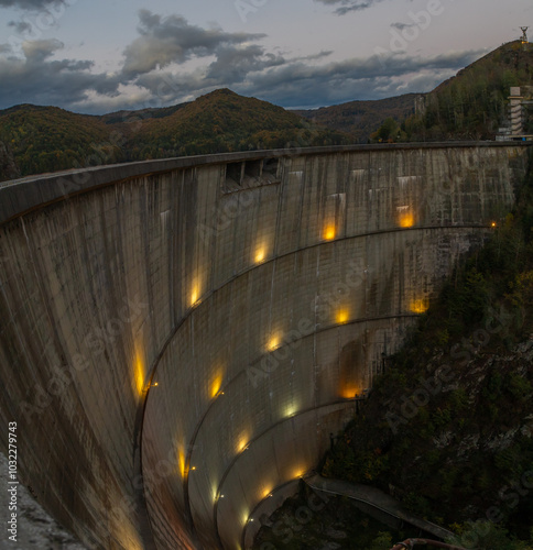 Vidraru dam in Arges county - Romania seen in the evening photo