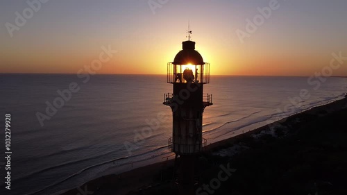 Eiffel Tower-Inspired Metal Lighthouse at Monte Hermoso: One of the Oldest Metal Structures in Argentina, Captured During a Stunning Sunset by the South Atlantic Coast.Breathtaking Views