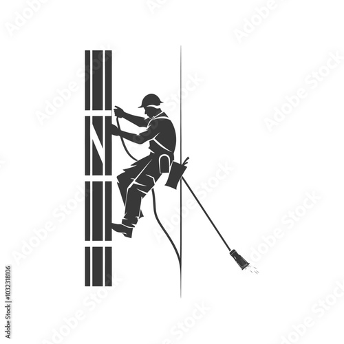 Silhouette of a Worker Cleaning a Tall Structure