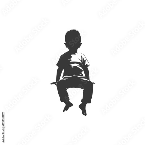 Silhouette of a young boy sitting with his legs dangling