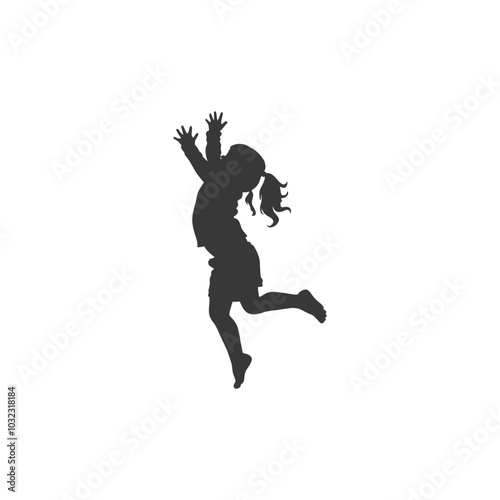 Silhouette of a young girl jumping with joy